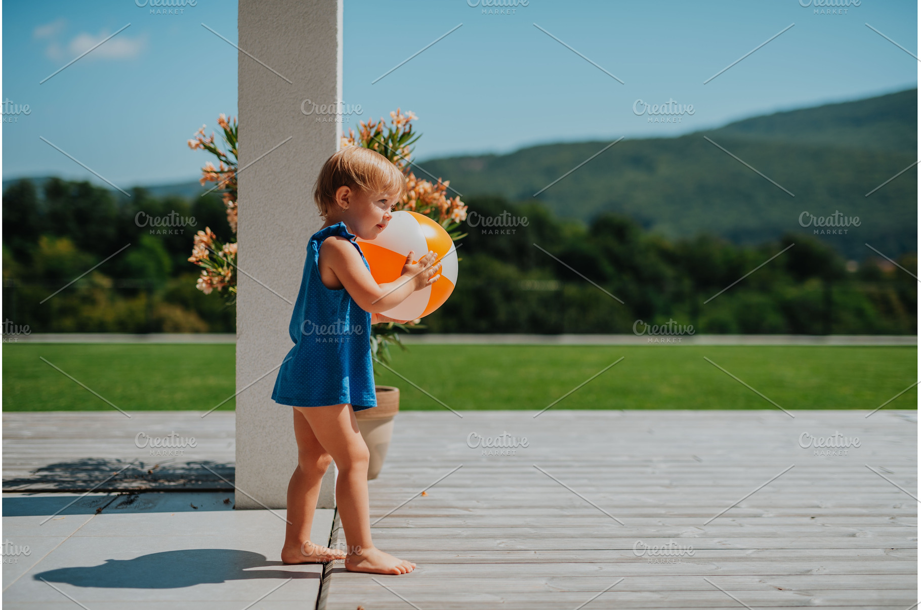 Little child enjoying outdoor, a Nature Photo by HalfPoint