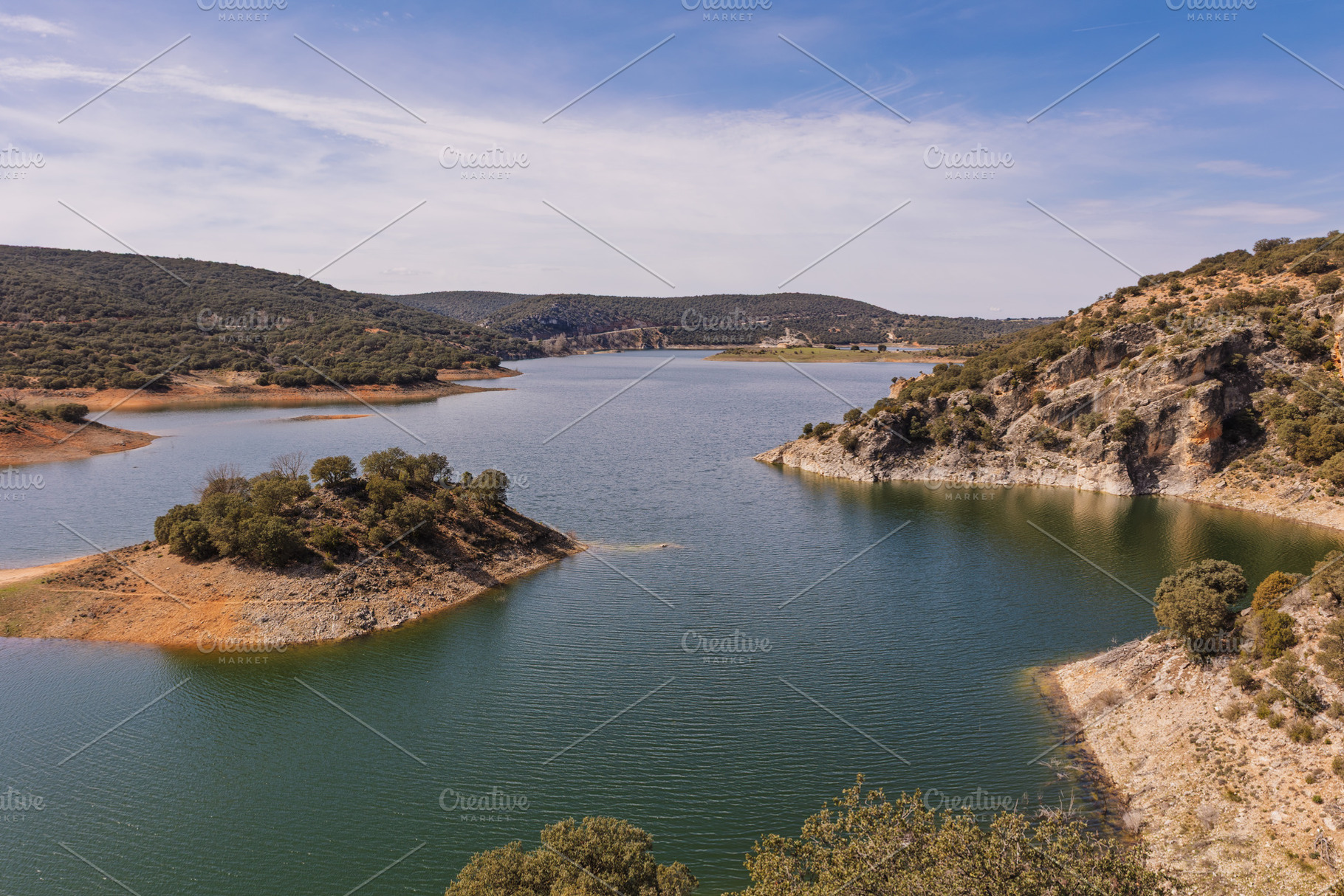 Serene reservoir nestled among rocky, a Nature Photo by Perpis