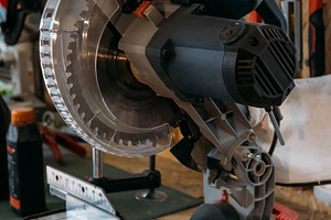 Miter saw woodworking equipment carpentry blade, an Industrial Photo by Photo Drive Studio