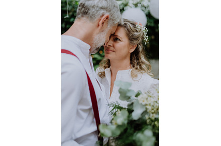 Mature bride and groom having a, a Person Photo by HalfPoint