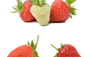 Ripe and unripe strawberries on a white isolated background, a Food & Drink Photo by ndanko