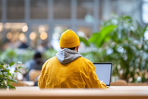 Rear view on a man in yellow beanie, a Business Photo by MistyDay