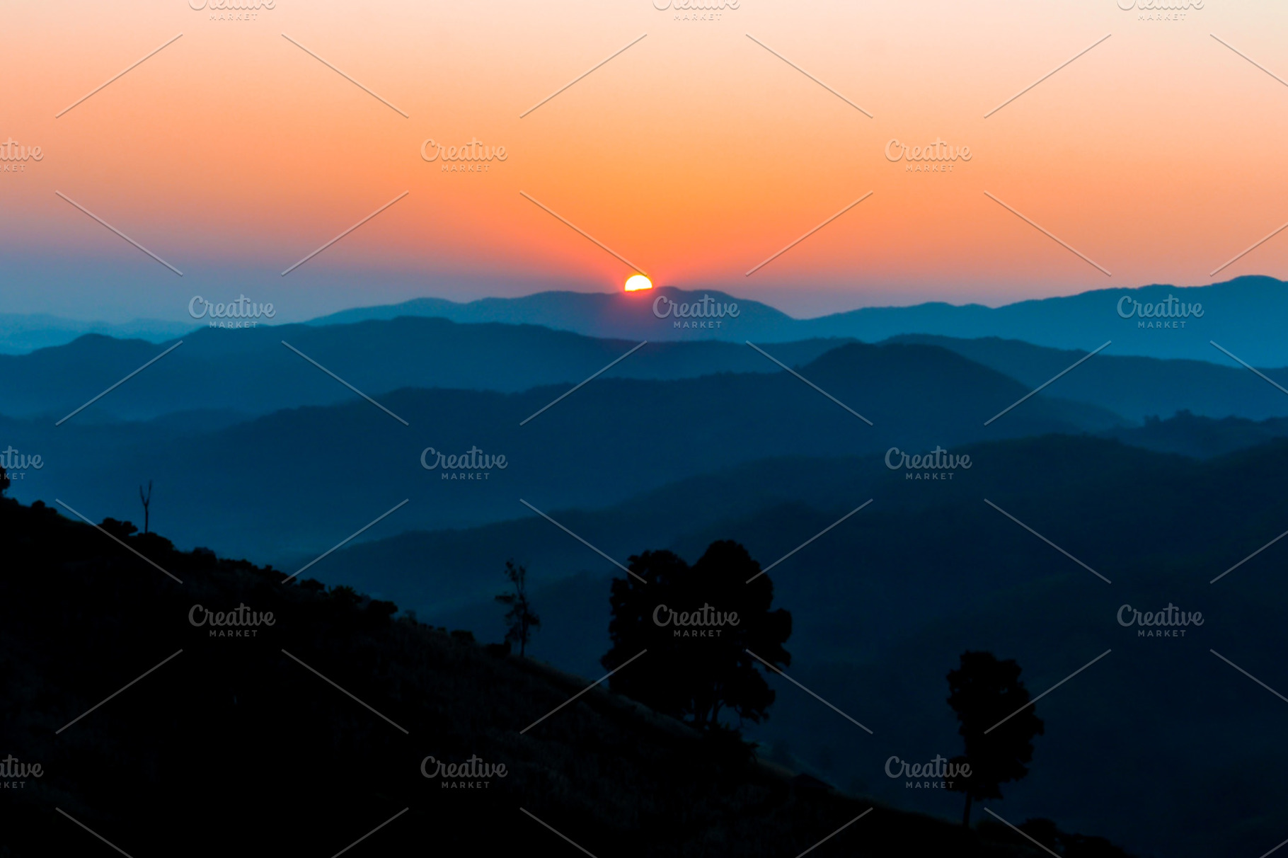Sunrise on mountain containing autumn, background, and beautiful, a Nature Photo by Artmeesri