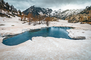 Early spring glacier lake, a Nature Photo by Alpine Dreams