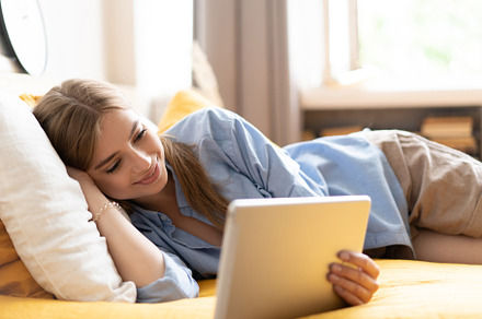 girl using tablet, a Person Photo by OPOLJA