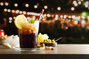 Table with drinks and snacks in a festive evening atmosphere, a Food & Drink Photo by Davizro's Market