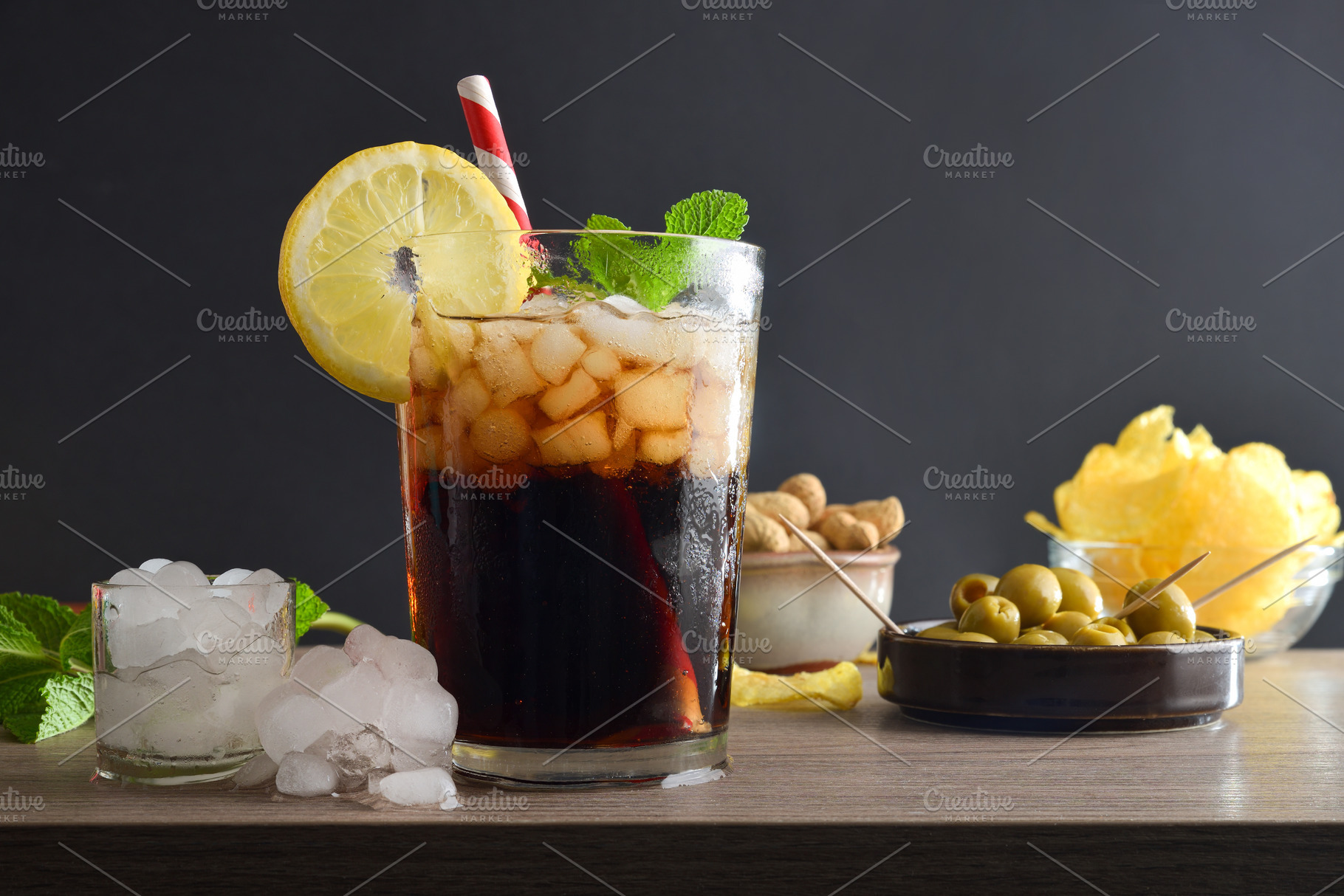 Refreshing cola drink on wooden table with snacks black backgrou, a Food & Drink Photo by Davizro's Market