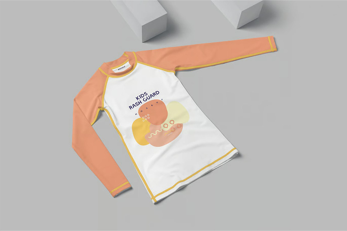 Kids Rash Guard Mockups, a Shirt Mockup by megostudi0 (Photo 7 of 7)