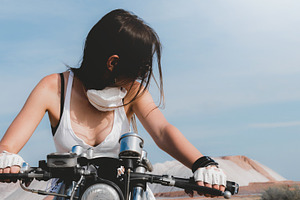 Sexy female on a motorcycle, a Transportation Photo by supamotion