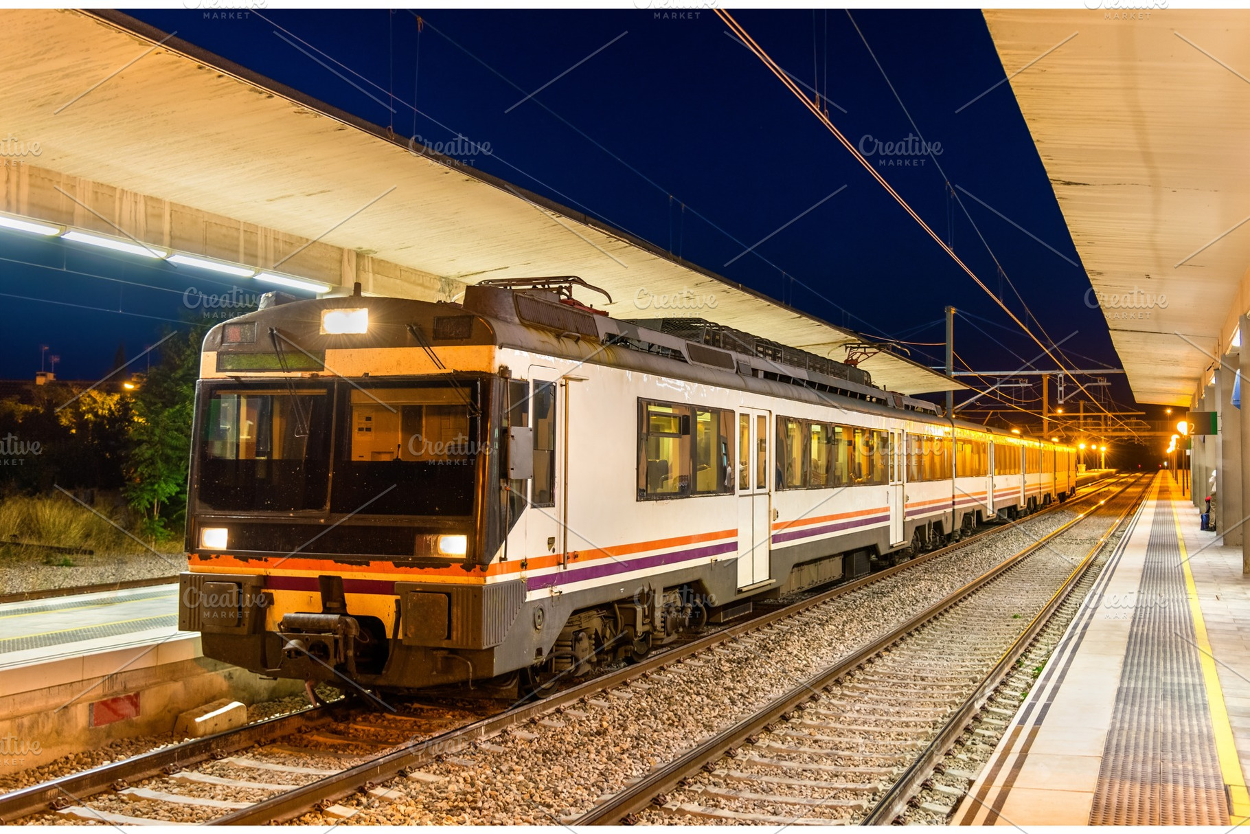 Regional train at Tudela de Navarra railway station - Spain, a Transportation Photo by Leonid Andronov