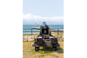 Ancient cannon facing the Solent, an Architecture Photo by Backyard Stock