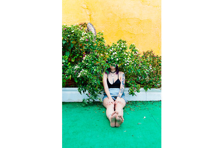 Thoughtful woman sitting alone, a Person Photo by Manu Reyes