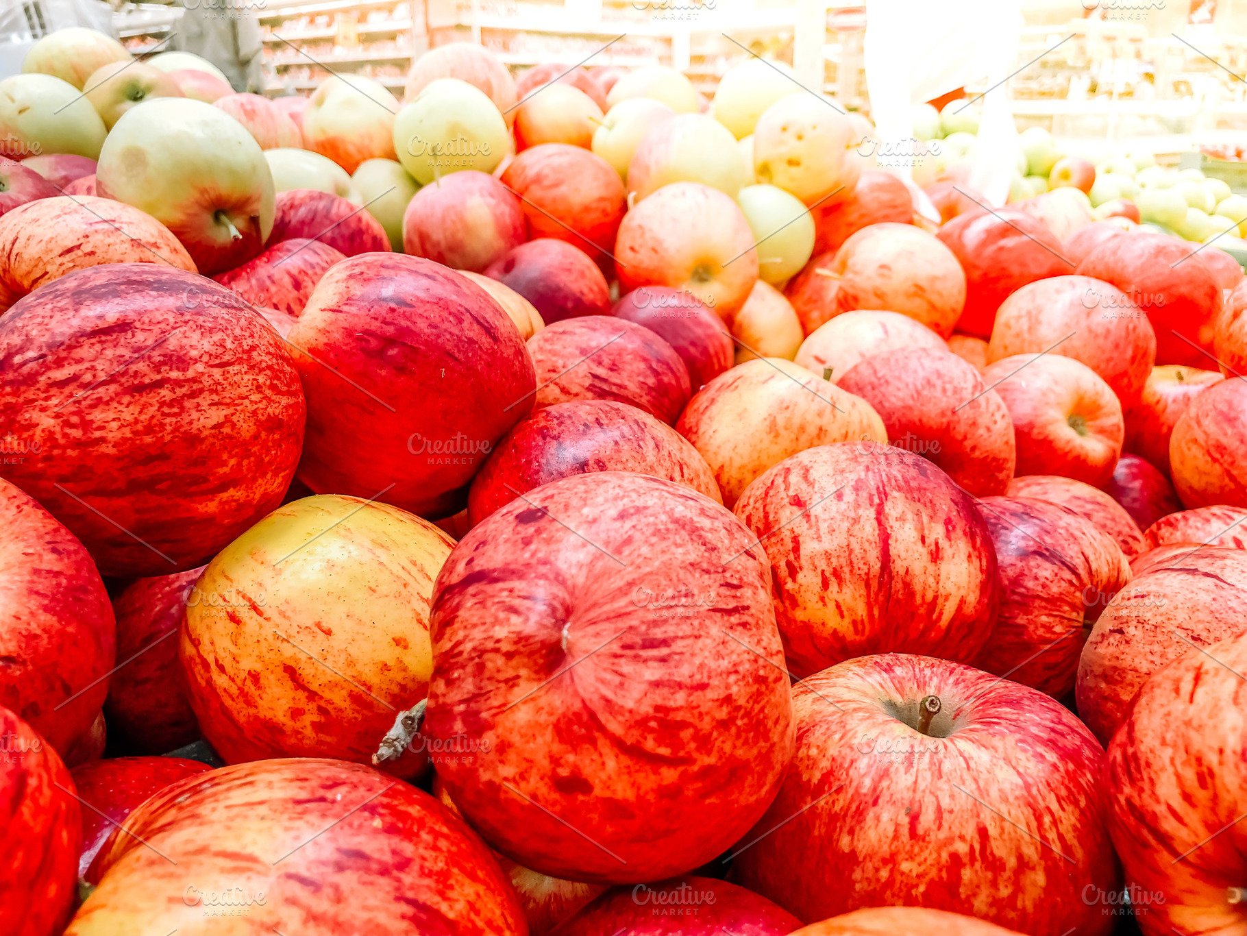 Red summer apples selling in a super containing market, supermarket, and red, a Food & Drink Photo by Dvoevnore photos