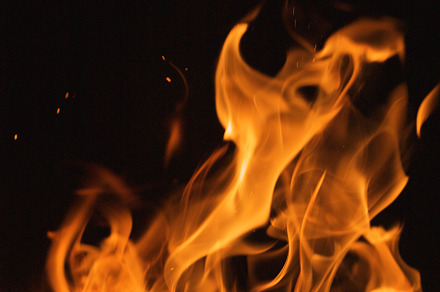 Dramatic flames against a dark background stock photo containing backdrop and, an Abstract Photo by Andy Dean Photography