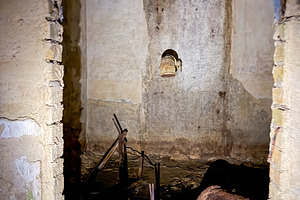 Dark abandoned room with old plumb pipes, an Architecture Photo by Vapi