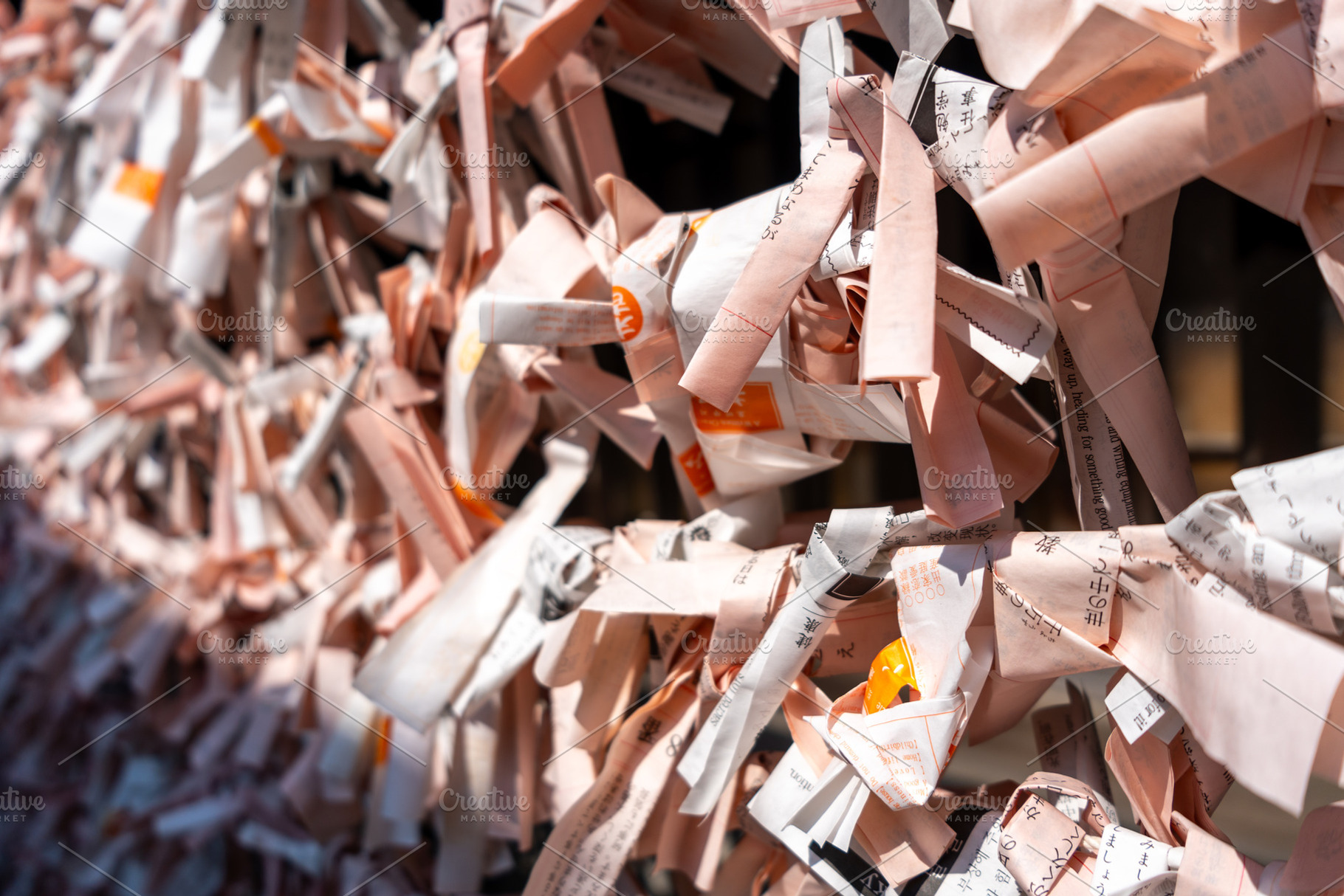 Omikuji paper fortunes at Hokoku Shrine in Osaka, Japan, a Background Photo by GoodGoods
