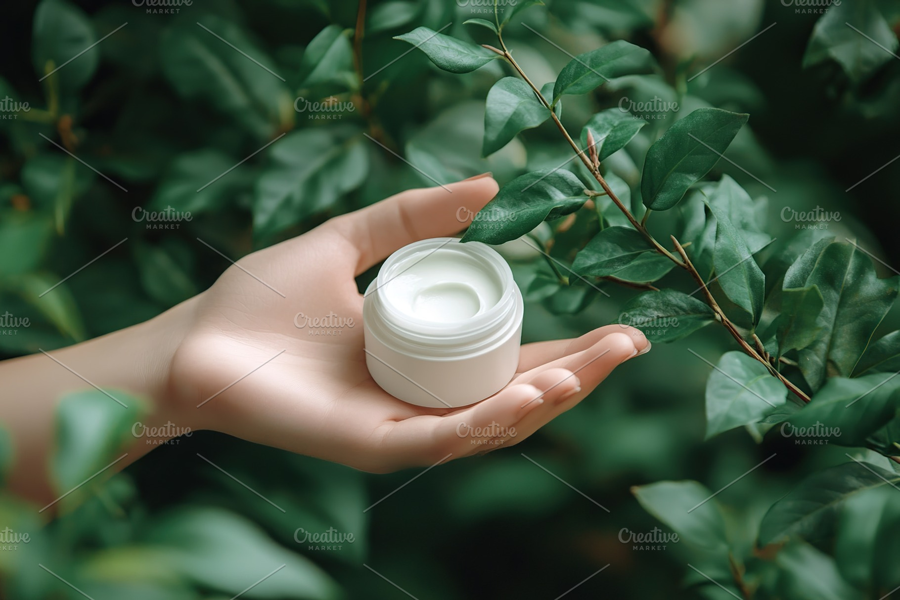Female model hand holding cosmetic jar on green leaves background, a Beauty & Fashion Photo by AlyaAnd