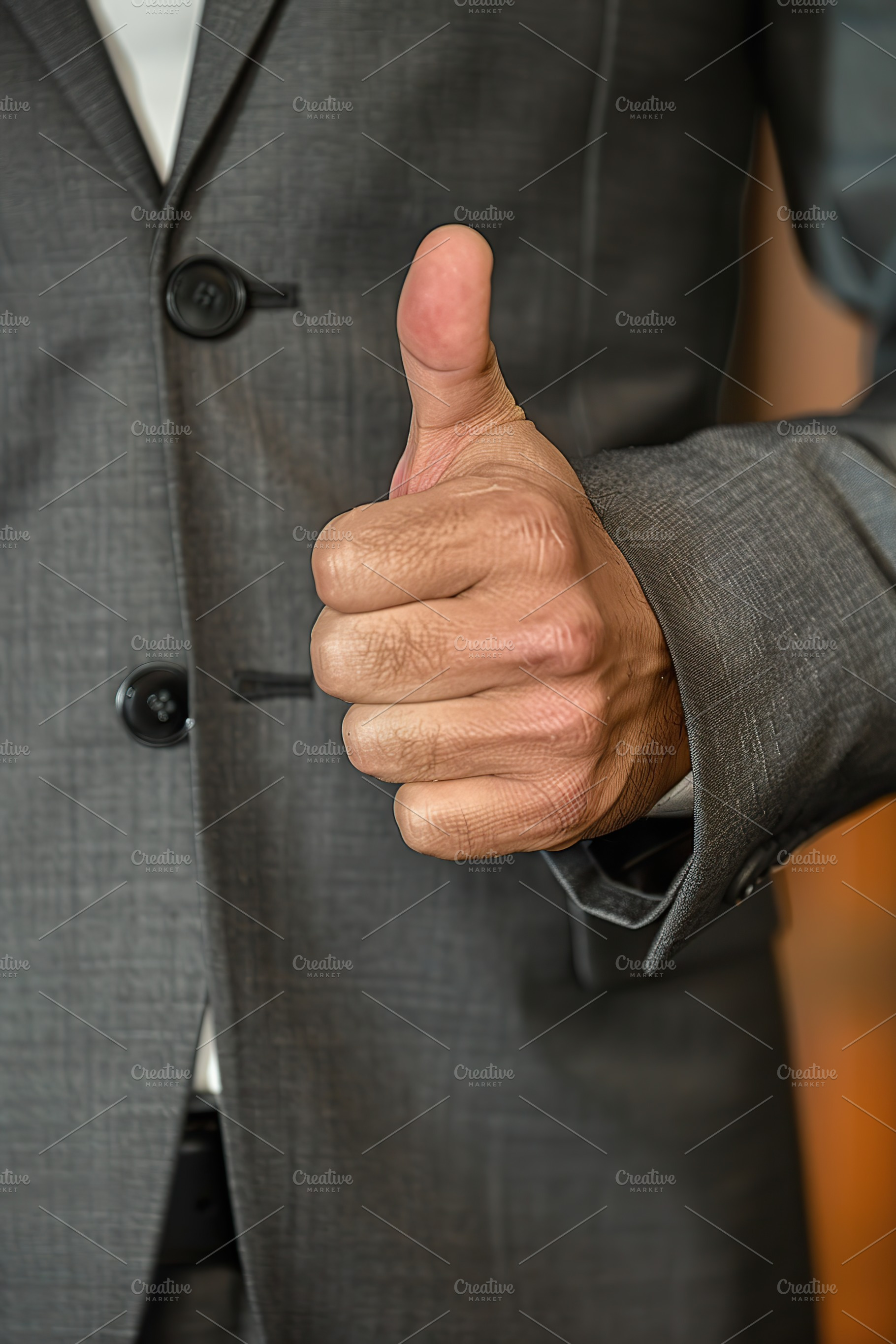 Businessman hand shows thumb up sign gesture, a Business Photo by AlyaAnd