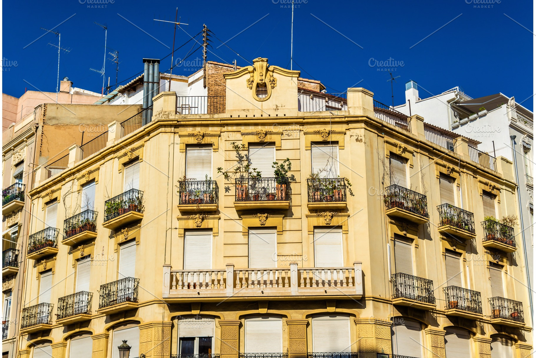 Beautiful buildings in the old town of valencia spain containing, an Architecture Photo by Leonid Andronov