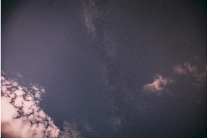 Cloudy Night Starry Sky With Glowing, a Graphic by Our Amazing World