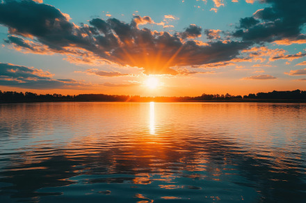 Tranquil sunset panorama over calm l, a Photo by Iftikhar Alam