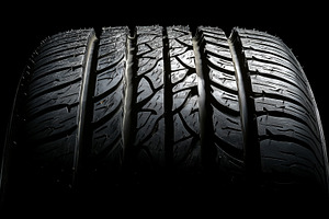 Close up on brand new car tire with, a Transportation Photo by MistyDay