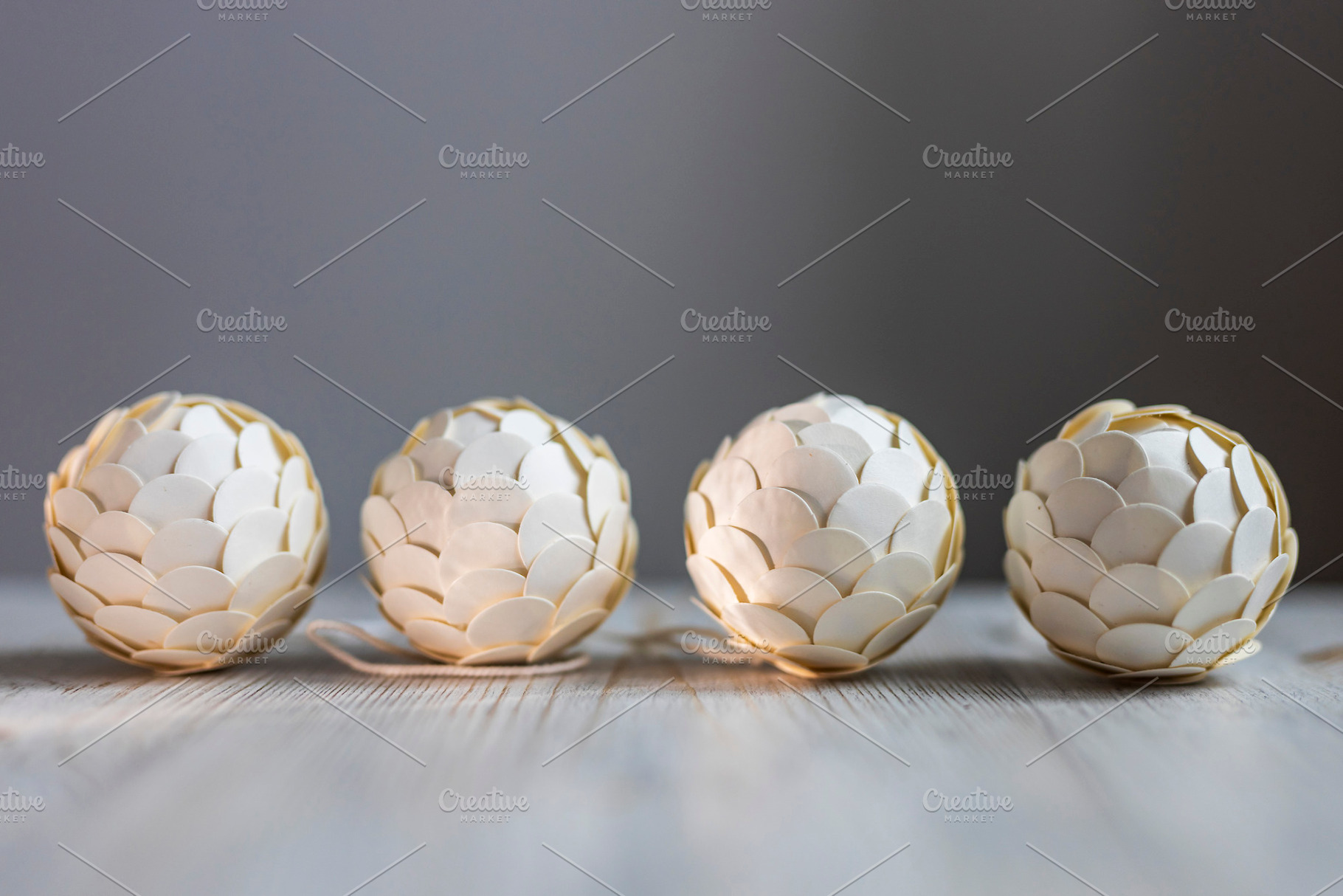 Four white decorative ball lights in, a Wallpaper Photo by Imaginarium