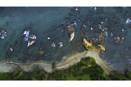 Top view of coast with rocks in, a Nature Photo by Media Whale Stock