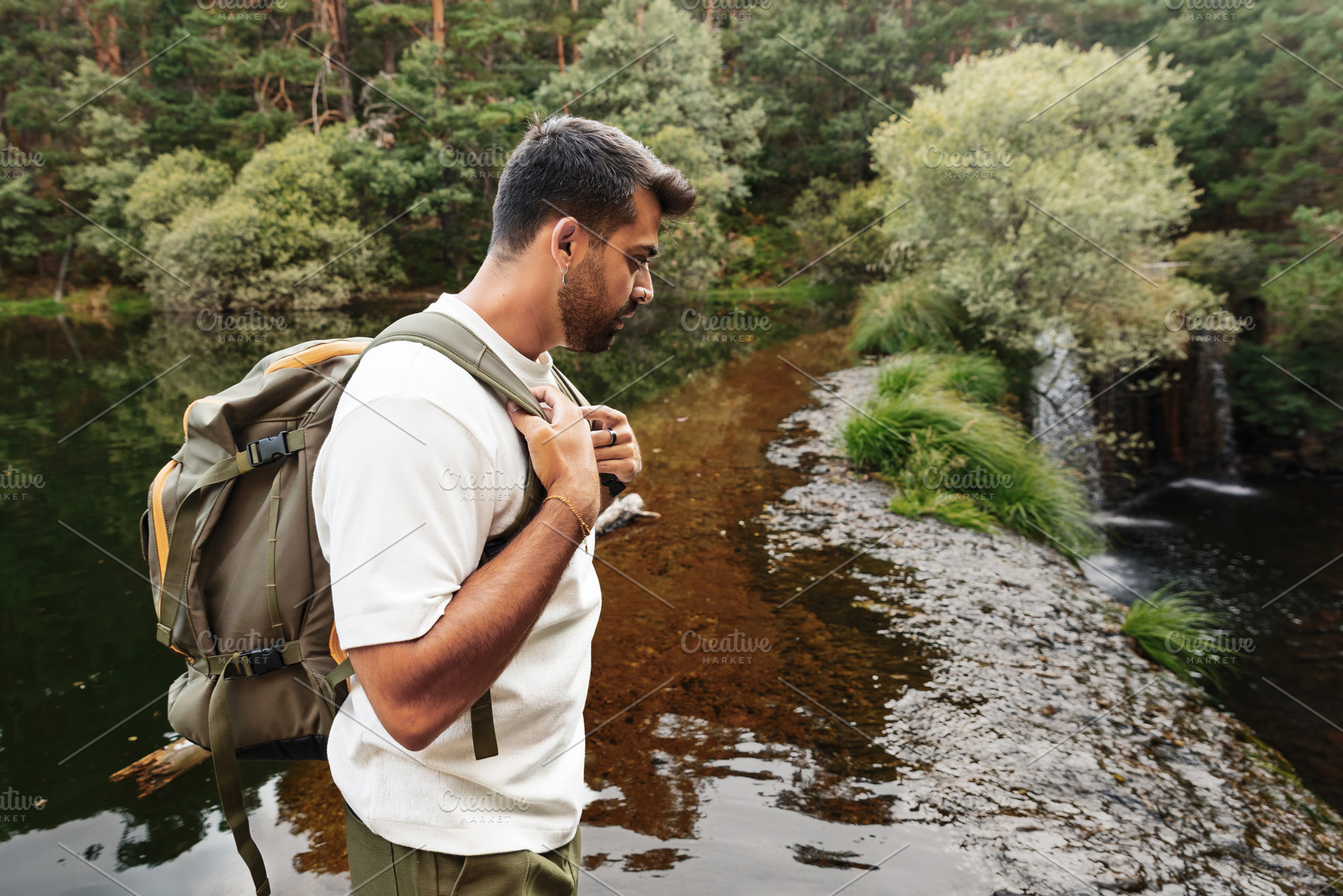 Man with backpack contemplating a st, a Sports & Recreation Photo by Perpis