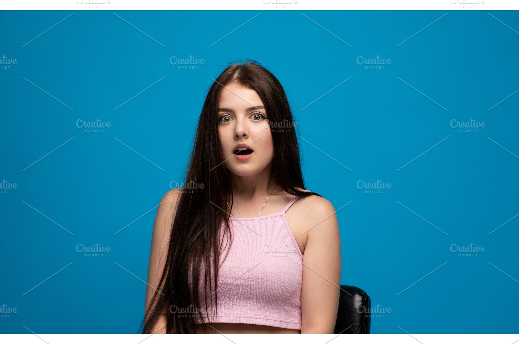 Young woman showing surprise emotion, a Person Photo by volodymyrshtun13795