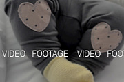 Active baby girl in yellow socks and, a Graphic by Grey Coast Media (Thumbnail 1 of 2)