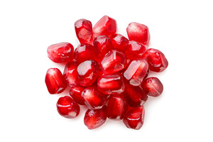 Pile of pomegranate seeds close-up, a Food & Drink Photo by innakreativ