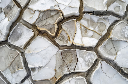 The cracked surface of salt flats cr, a Photo by Tanuart