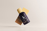Violet Glass Cosmetic Bottle Mock-up, a Cups & Container Mockup by pmvch (Thumbnail 4 of 20)