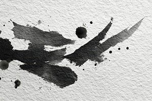 Black ink splashes on texture, a Photo by Pavel_design