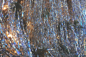 Closeup of shiny silver tinsel., a Holiday Photo by rorygez fresh