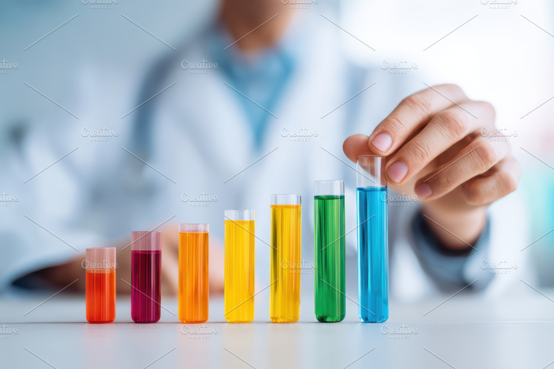 Colorful test tubes in a laboratory setting, a Business Photo by AlyaAnd