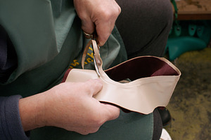 Shoe craft leather workshop material scissors, a Person Photo by Photo Drive Studio