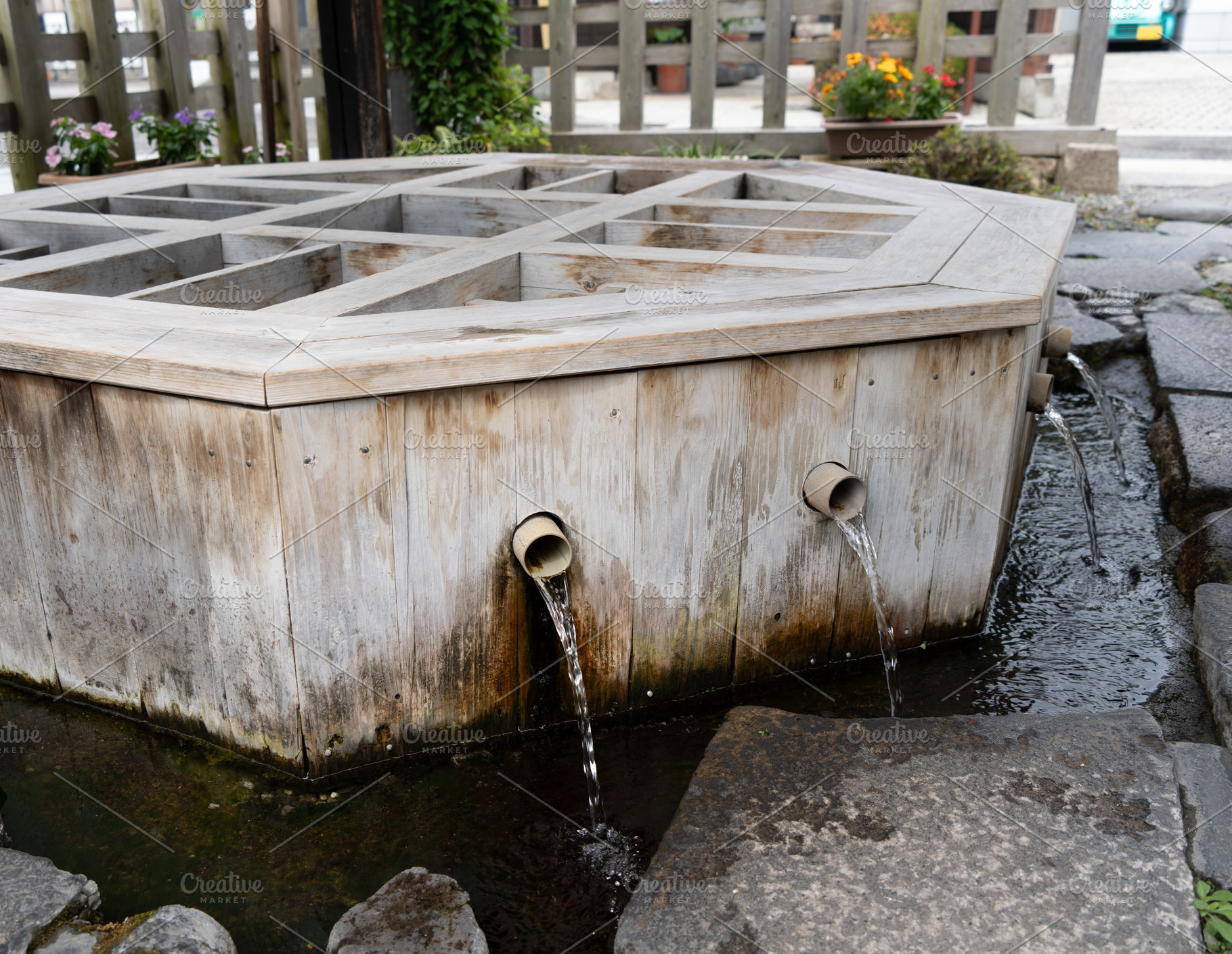Wooden spring water well in the town of Matsumoto, Japan, an Architecture Photo by GoodGoods