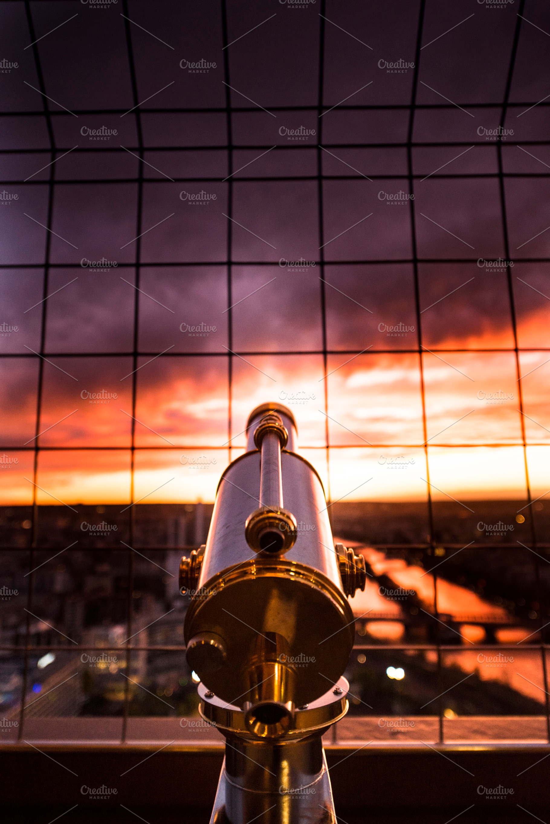 Telescope aimed at Sunset in Paris, a Technology Photo by NomadicA
