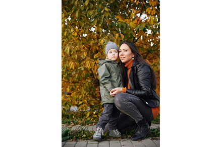 beautiful woman hugs her son in the, a Person Photo by Super duper stock images 