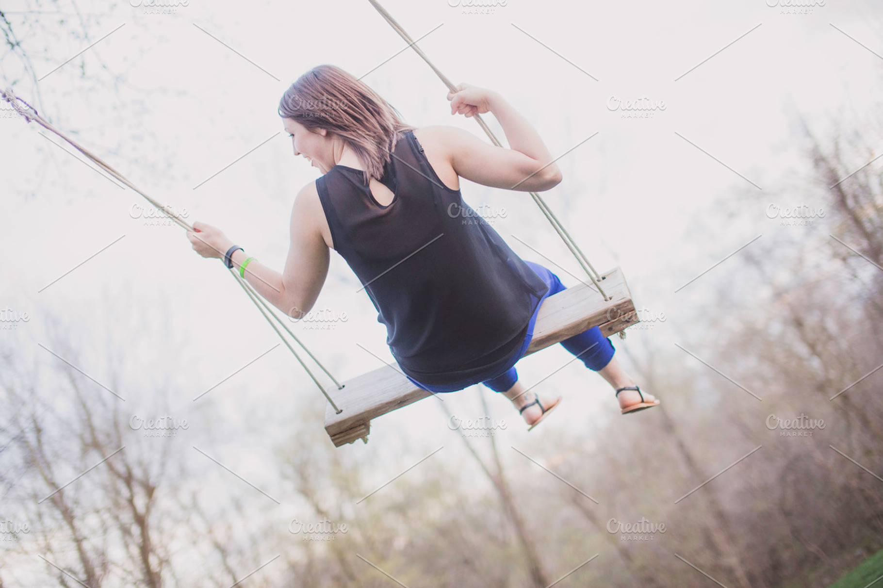 Swing into the sky, a Person Photo by movielighter