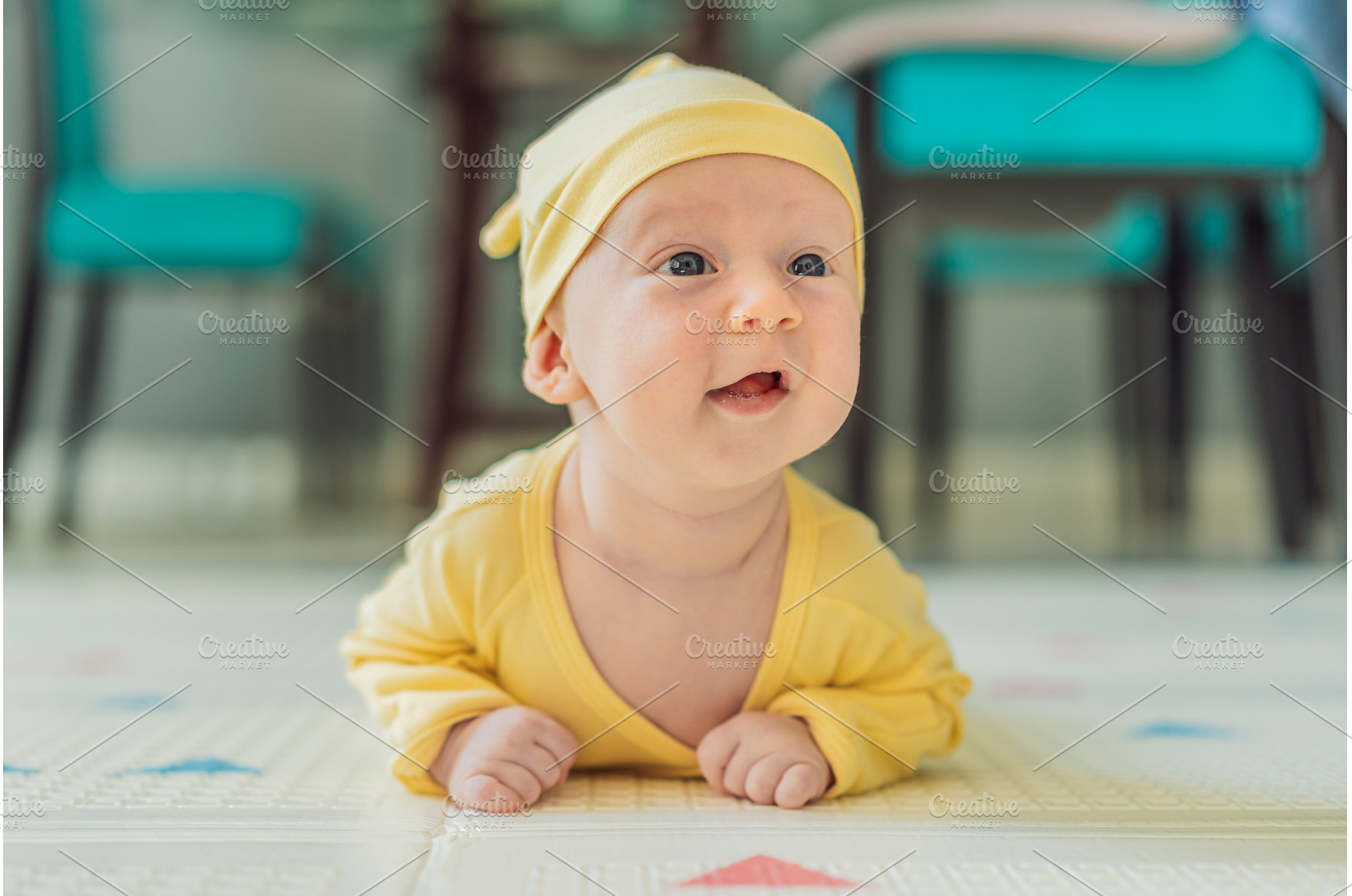 One-month-old baby lying on tummy, a Person Photo by Elizaveta Galitskaya