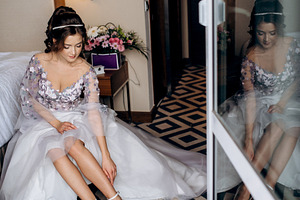 A portrait of a bride in the morning at a hotel, a Person Photo by Weddings, People, Travel
