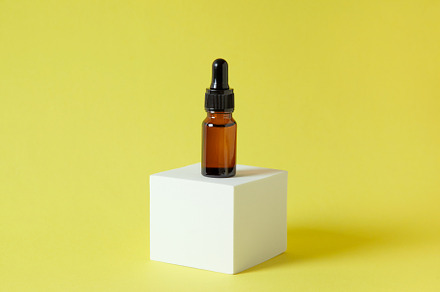 glass bottle with cosmetics
