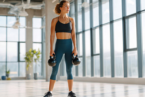 Woman Exercising with Kettlebell in Gym, a Sports & Recreation Photo by AlyaAnd