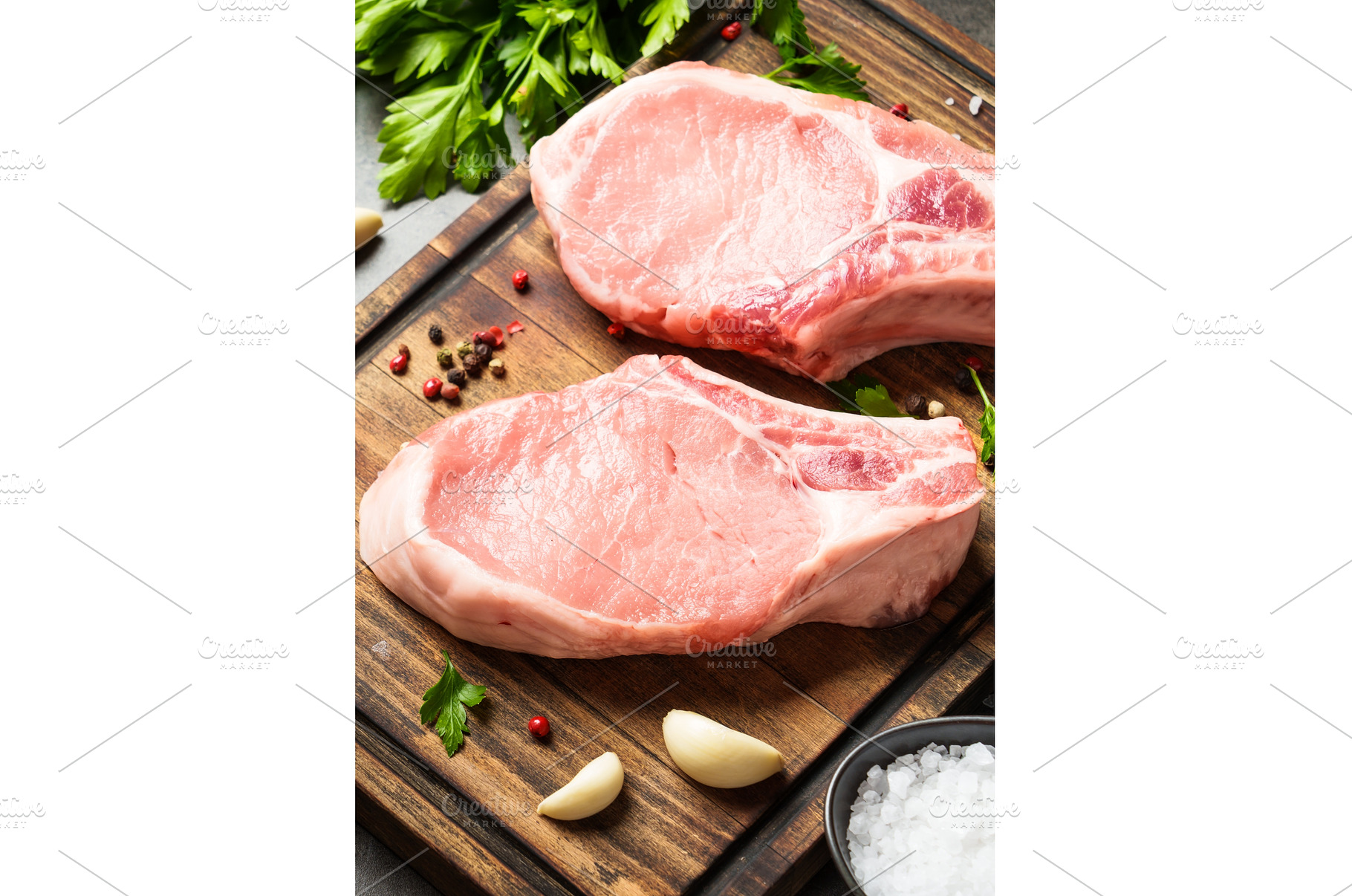 Raw pork meat on cutting board with, a Food & Drink Photo by Nadia-nb