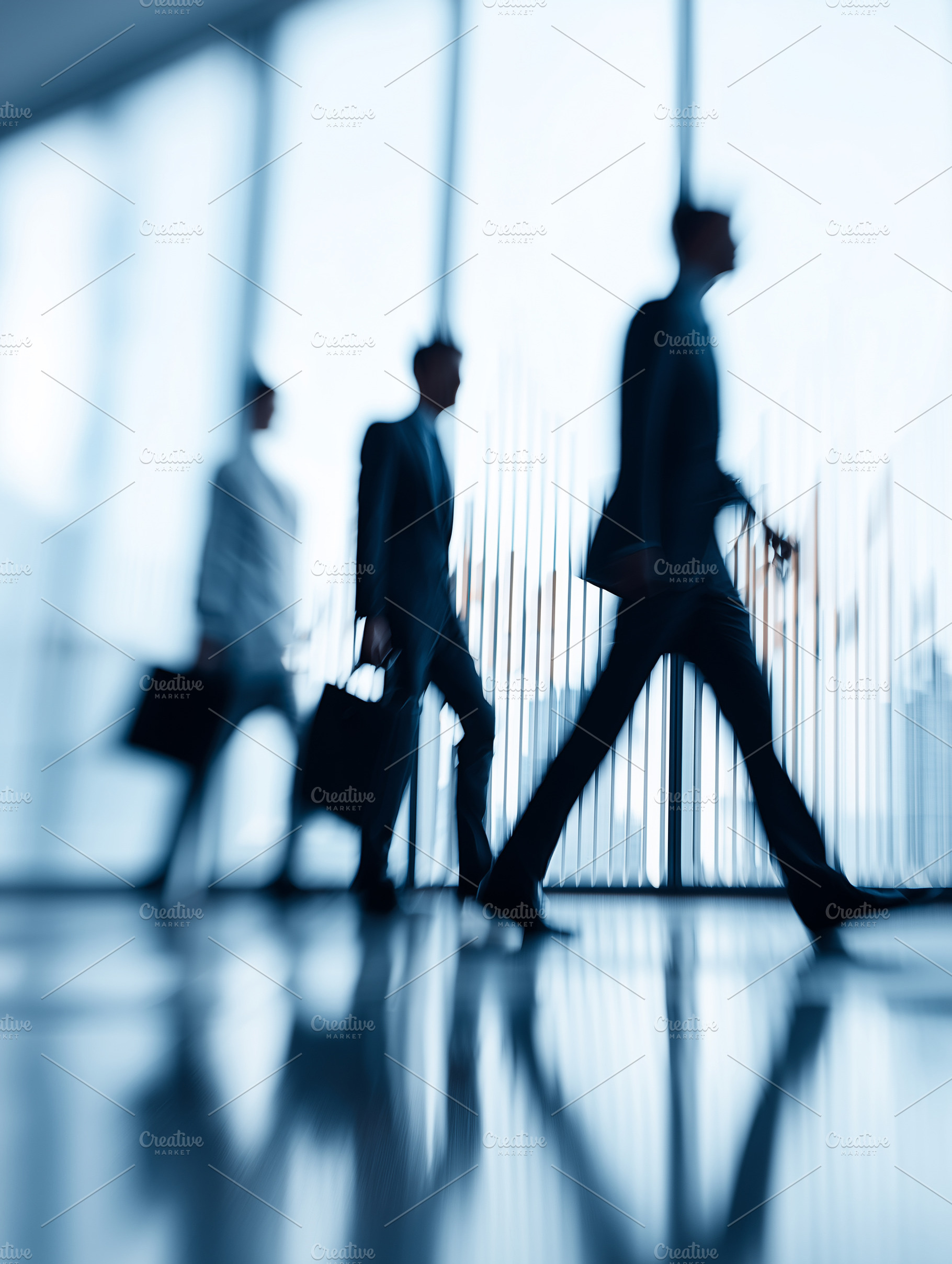 Blurred silhouettes of business, a Business Photo by MistyDay