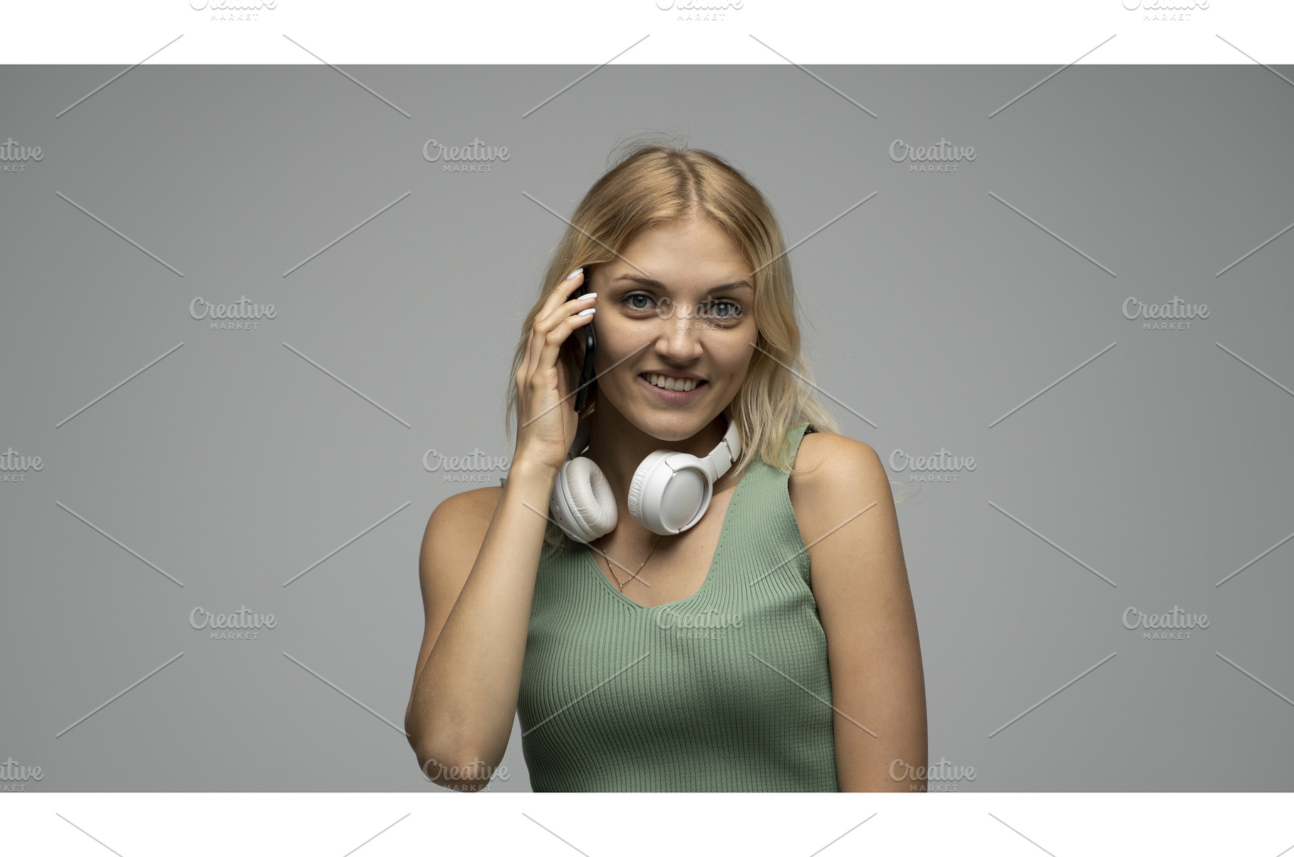 Smiling happy young blonde female, a Person Photo by volodymyrshtun13795