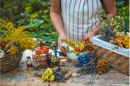 Woman with medicinal herbs and, a Nature Photo by yanadjana